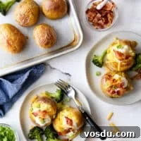 plating baked potato servings with toppings and sheet pan in the corner