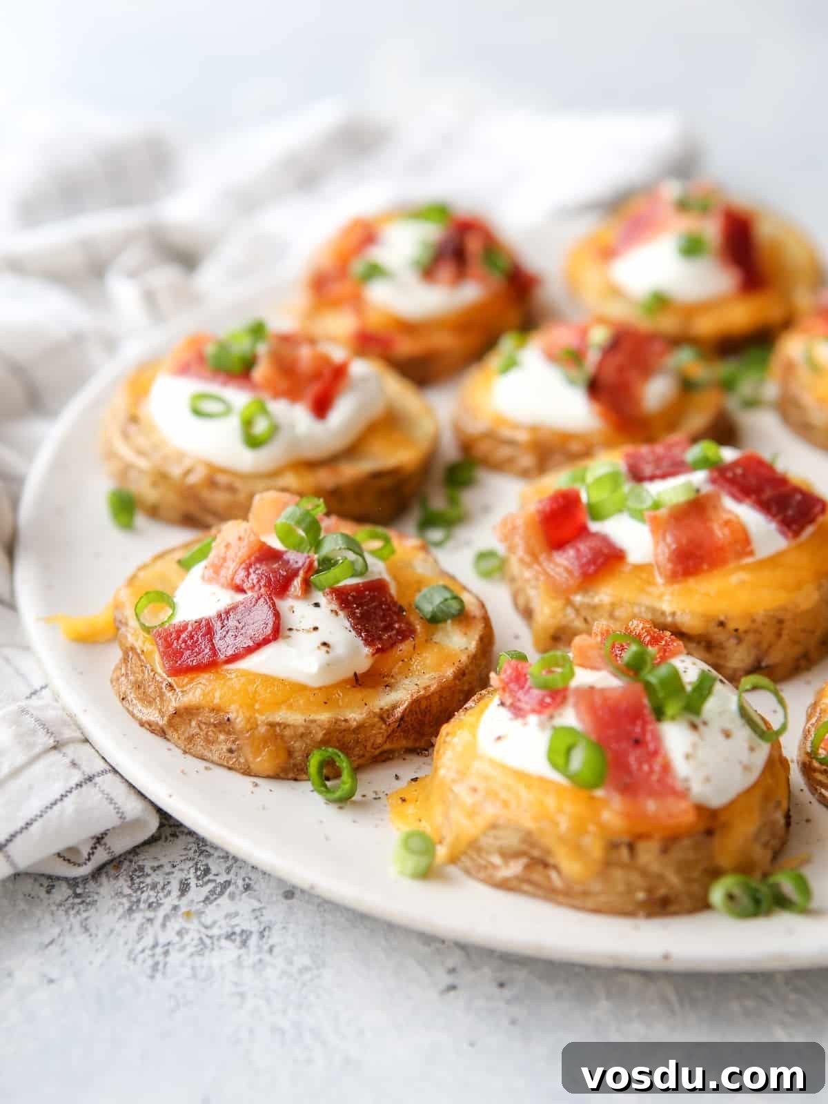 Loaded Baked Potato Sheet Pan Dinner -> Sheet Pan Loaded Baked Potato Dinner for Family Meals 6 These irresistible baked potato bites are loaded up with cheese, sour cream, bacon and chives