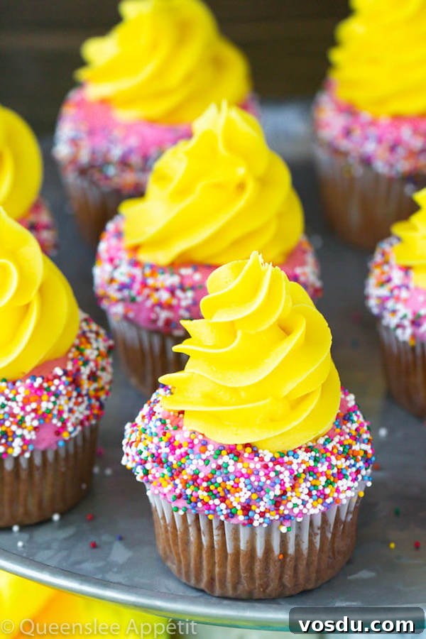 Banana Split Cupcakes Banana split cupcakes with strawberry and vanilla buttercream and sprinkles