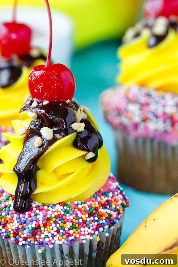 Banana Split Cupcakes Banana split cupcakes topped with chocolate sauce, chopped nuts and a cherry