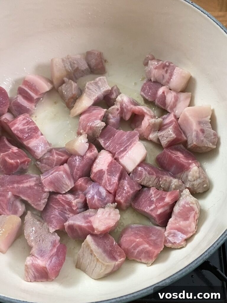 Authentic Filipino Pork Adobo Recipe — Tender, Savory Comfort 5 sauteeing pork belly