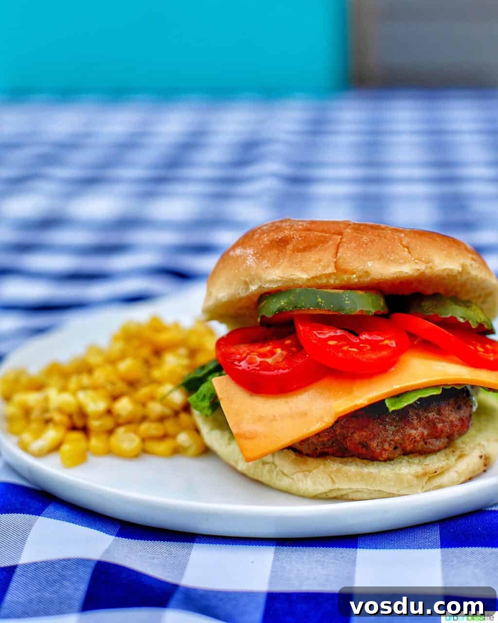 Ultimate Guide to Burgers: Build Your Own Burger Bar at Home 6 burger and side of corn on checkered tablecloth