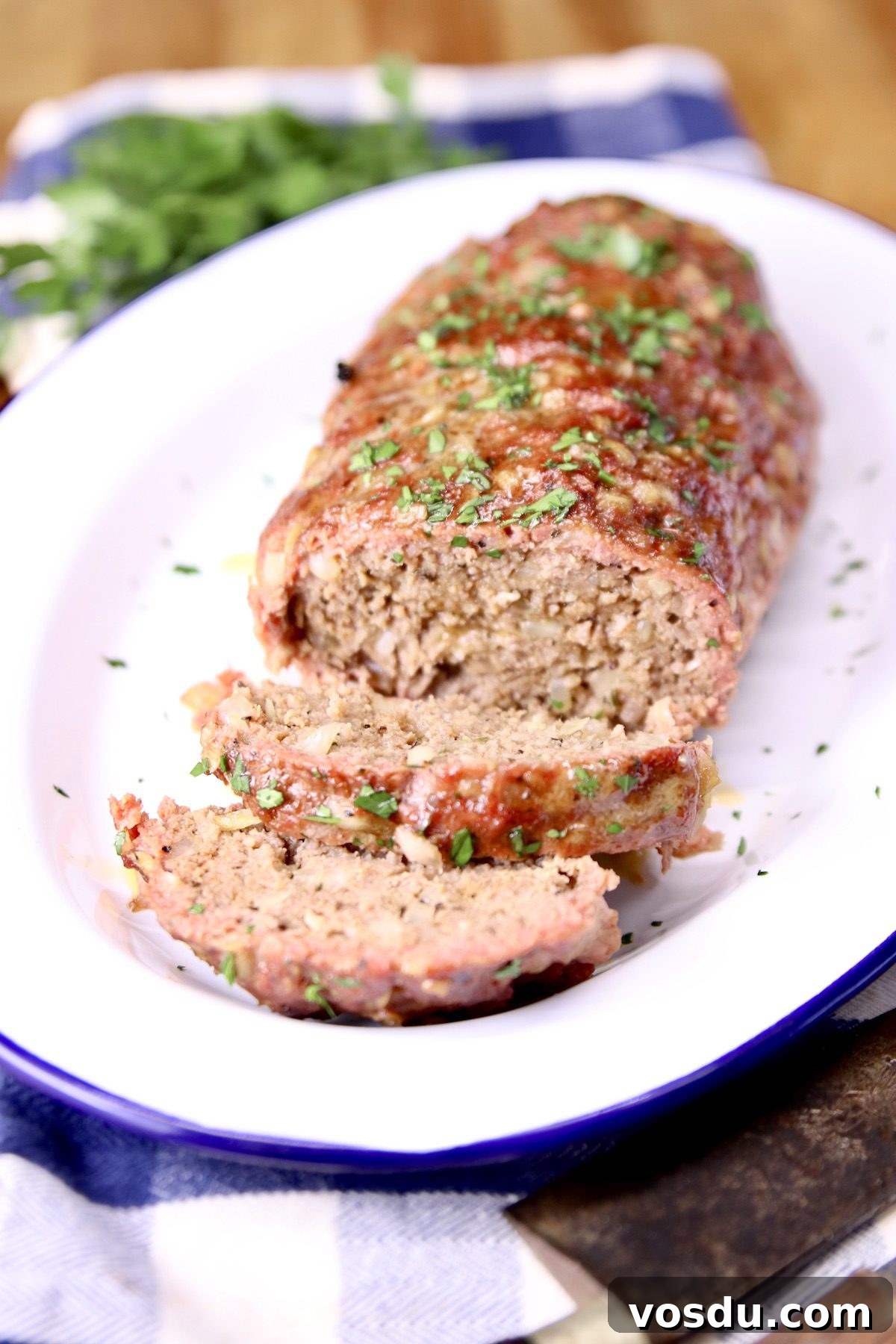 Sliced grilled meatloaf sliced meatloaf on a platter