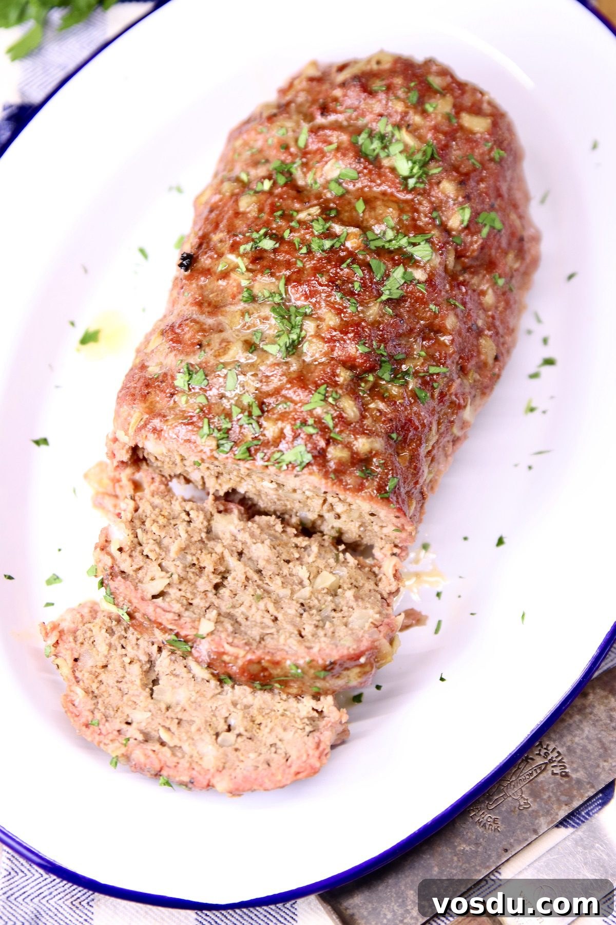 Partially sliced grilled meatloaf Grilled meatloaf - overhead view - partially sliced