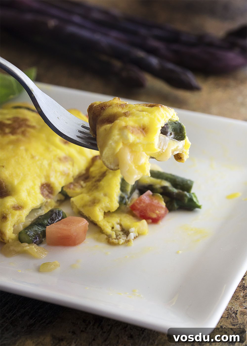 Smoked Gouda & Asparagus Omelet Recipe for Brunch Delight 2 Take advantage of fresh asparagus to make a healthy spring omelette! This asparagus omelette is full of smoked gouda cheese, sauteed onions, and tomatoes. Great for breakfast, brunch, or even dinner.