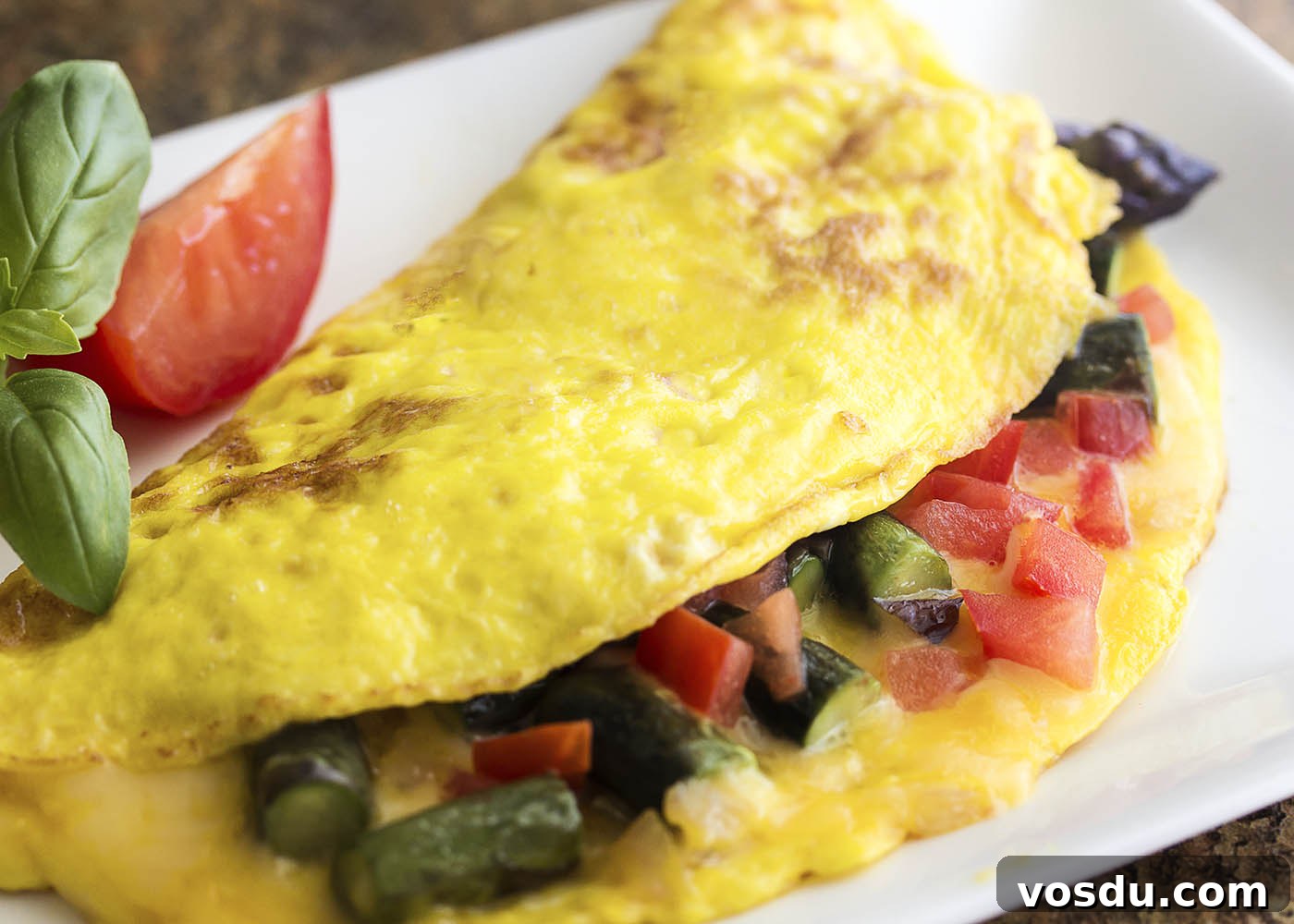 Smoked Gouda & Asparagus Omelet Recipe for Brunch Delight 4 Take advantage of fresh asparagus to make a healthy spring omelette! This asparagus omelette is full of smoked gouda cheese, sauteed onions, and tomatoes. Great for breakfast, brunch, or even dinner.