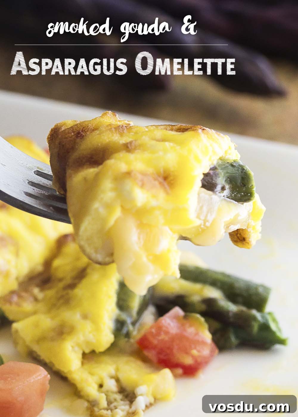 Take advantage of fresh asparagus to make a healthy spring omelette! This asparagus omelette is full of smoked gouda cheese, sauteed onions, and tomatoes. Great for breakfast, brunch, or even dinner.