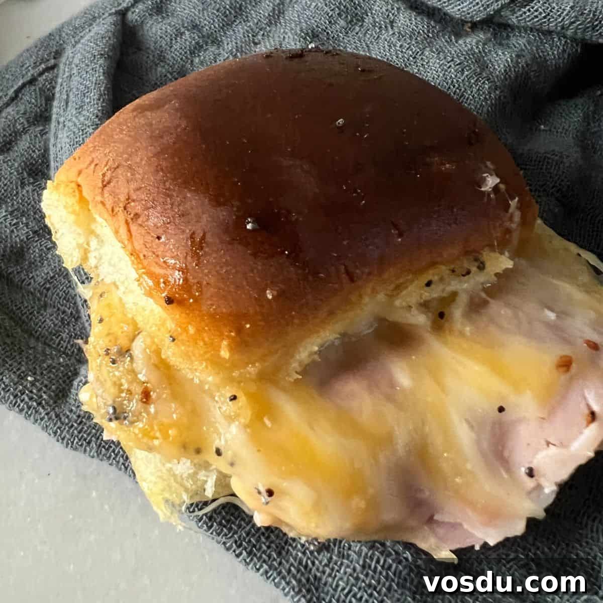 Crispy Air Fryer Ham & Melted Cheese Sandwiches 2 Hot ham and cheese sliders fresh out of the oven.
