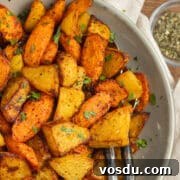 This is a picture of a plate with air fryer carrots and potatoes.