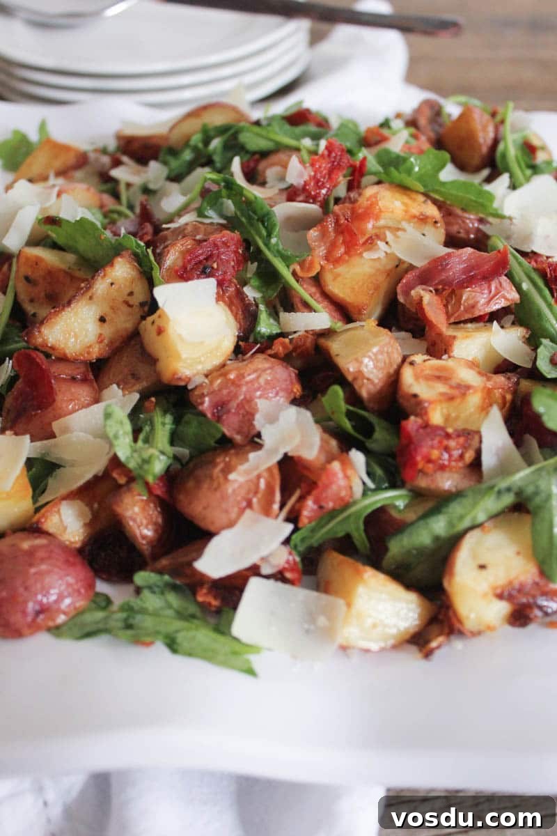 warm-roasted-potato-salad-with-pancetta-sun-dried-tomatoes-and-arugula-3