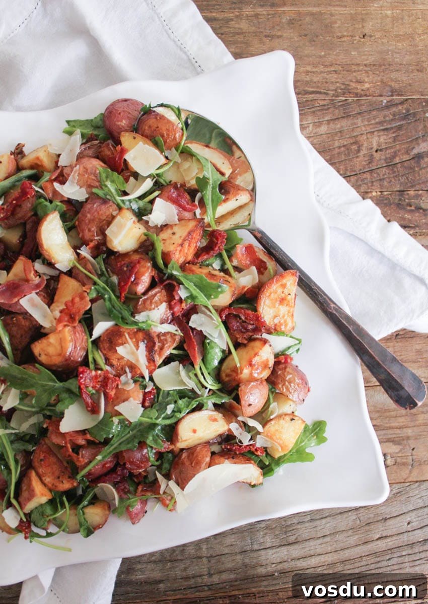 warm-roasted-potato-salad-with-pancetta-sun-dried-tomatoes-and-arugula-4