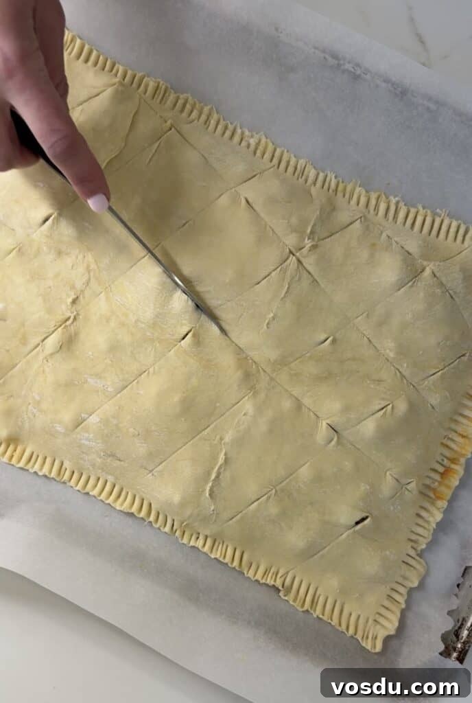 Sheet Pan Meat Bourekas for a Memorable Purim Seudah 5 scoring sheet pan meat bourekas