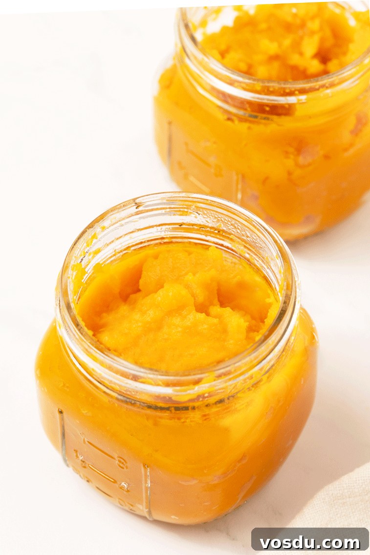 Homemade Pumpkin Puree From Scratch — Step-by-Step Recipe 2 two mason jars of homemade pumpkin puree