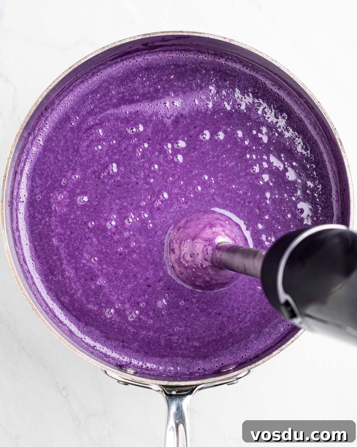 Homemade Ube Halaya (Purple Yam Jam) 8 using immersion blender to purée purple yam mixture.