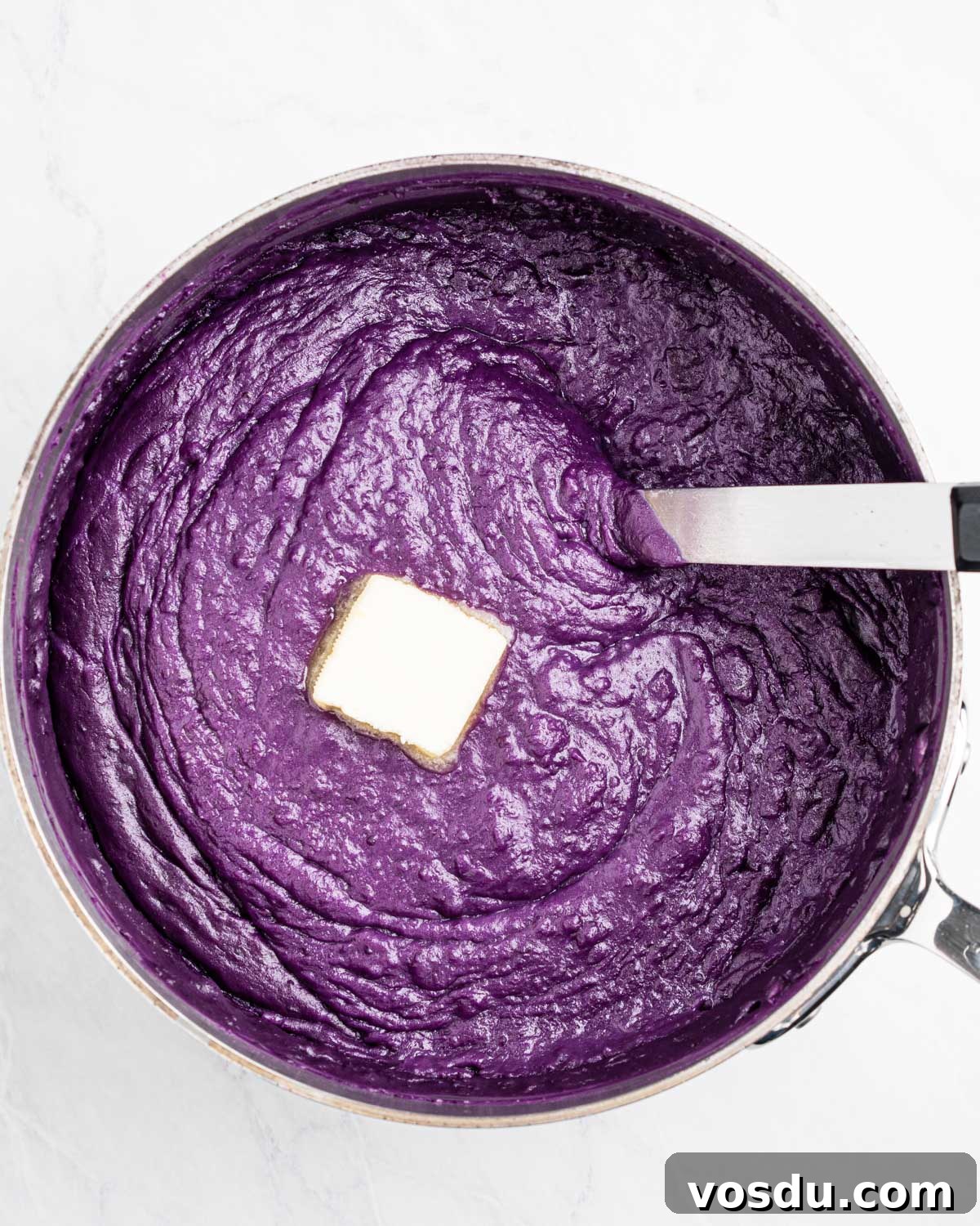Homemade Ube Halaya (Purple Yam Jam) 9 adding butter to yam mixture.