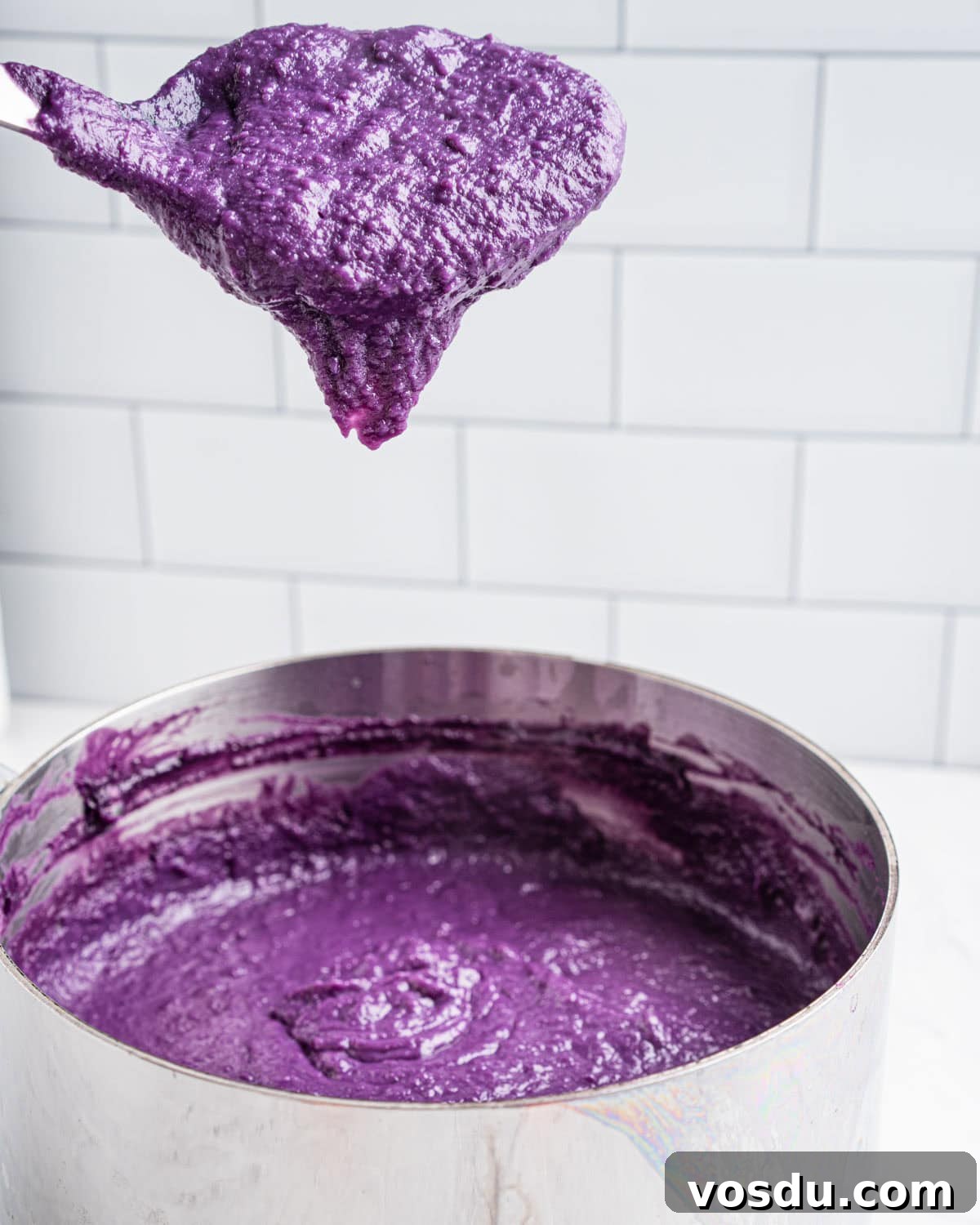 Homemade Ube Halaya (Purple Yam Jam) 10 spoonful of ube jam showing smooth consistency.