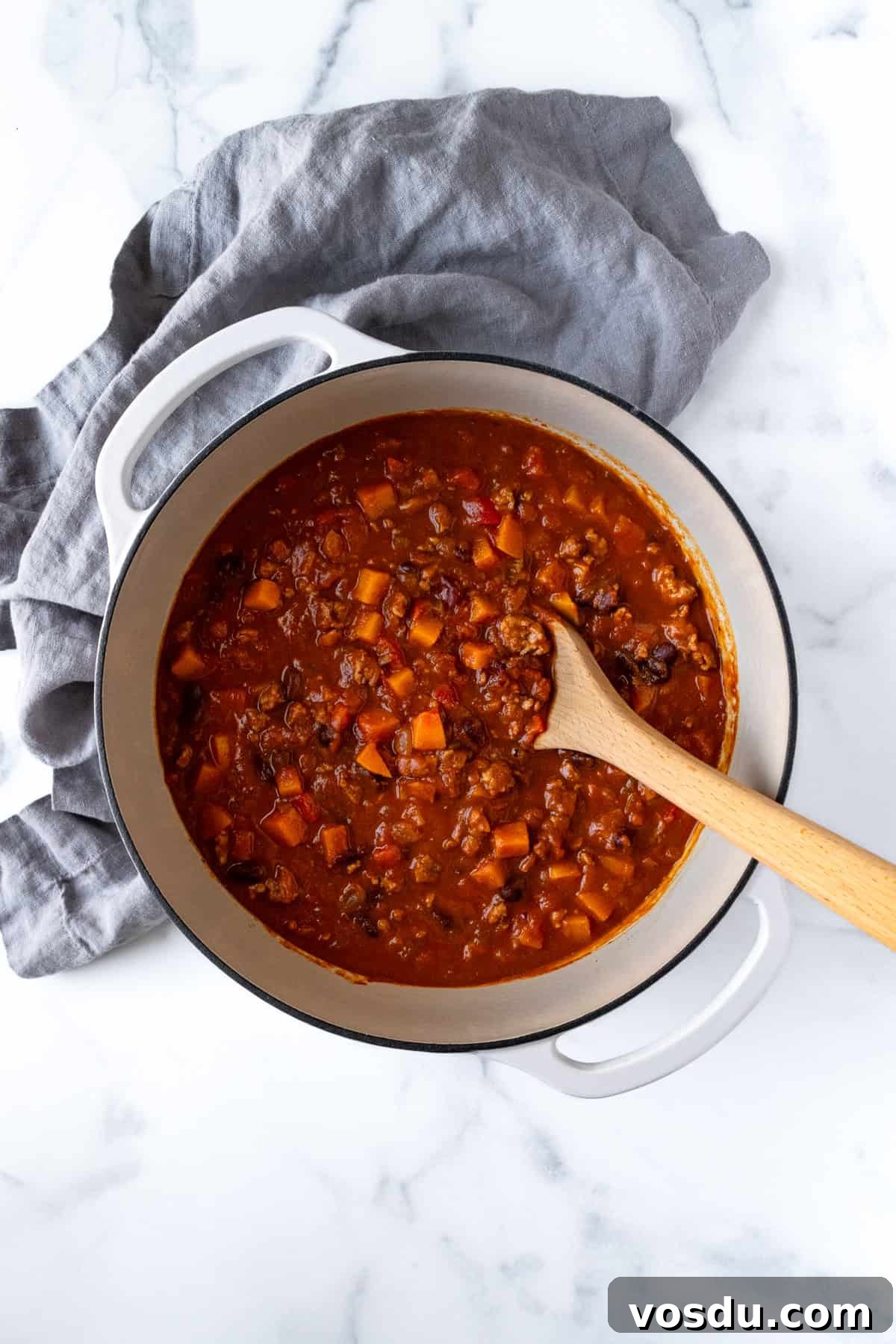 Turkey Butternut Squash Chili in a White Dutch Oven.