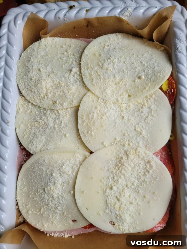 Italian Hawaiian Mini Roll Sliders Recipe 6 italian sliders covered in provolone cheese