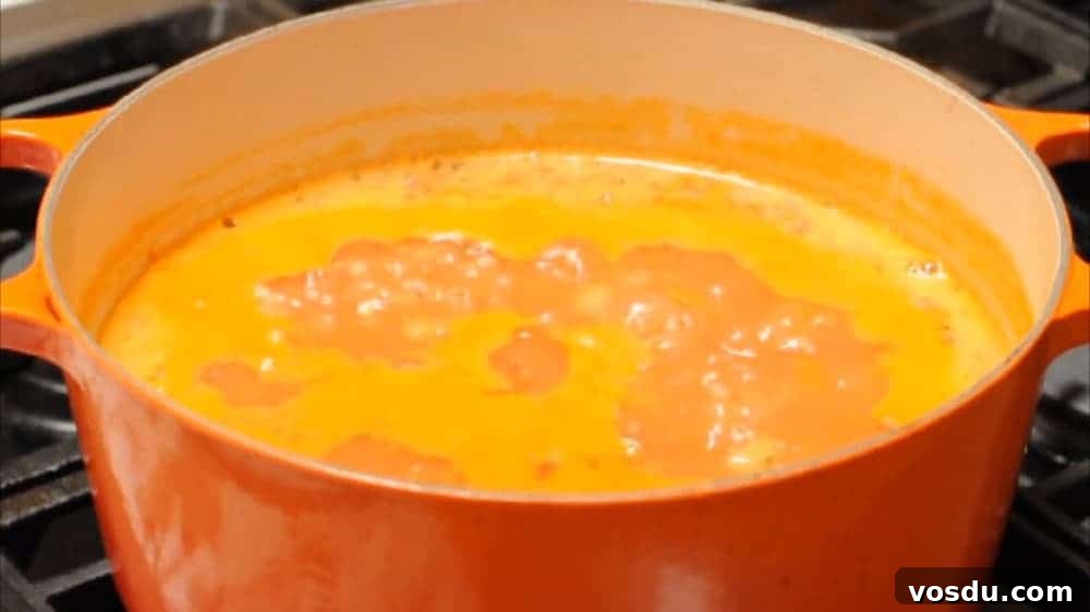 Classic Pasta e Fagioli: Hearty Italian Pasta and Bean Soup 7 Add tomatoes then simmer
