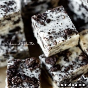 Cookies and Cream Fudge Recipe: Rich No-Bake Dessert Guide 13 Randomly stacked pieces of cookies and cream fudge.