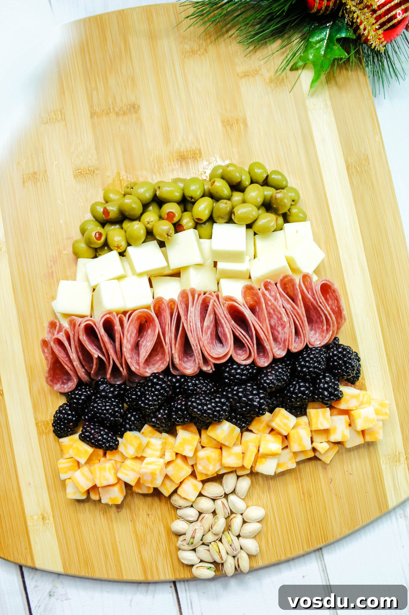 Christmas Tree Charcuterie Board Ideas for Holiday Entertaining 7 In process of the Christmas Tree Charcuterie Board