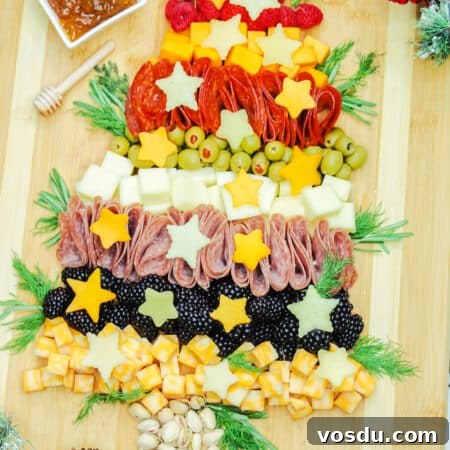 Christmas Tree Charcuterie Board Ideas for Holiday Entertaining 9 Christmas tree Charcuterie Board on a cutting board