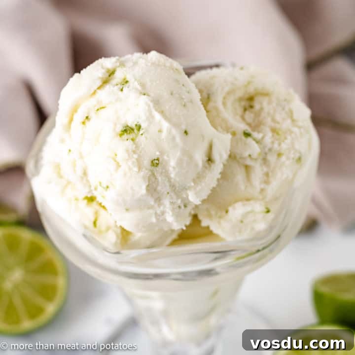 Top down view lime sherbet in a glass dish.