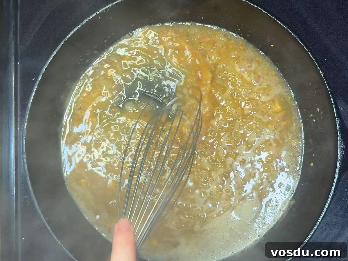 Savory Warm Bacon Vinaigrette for Salads and Vegetables 7 Whisking apple cider vinegar and dijon mustard into the bacon grease.