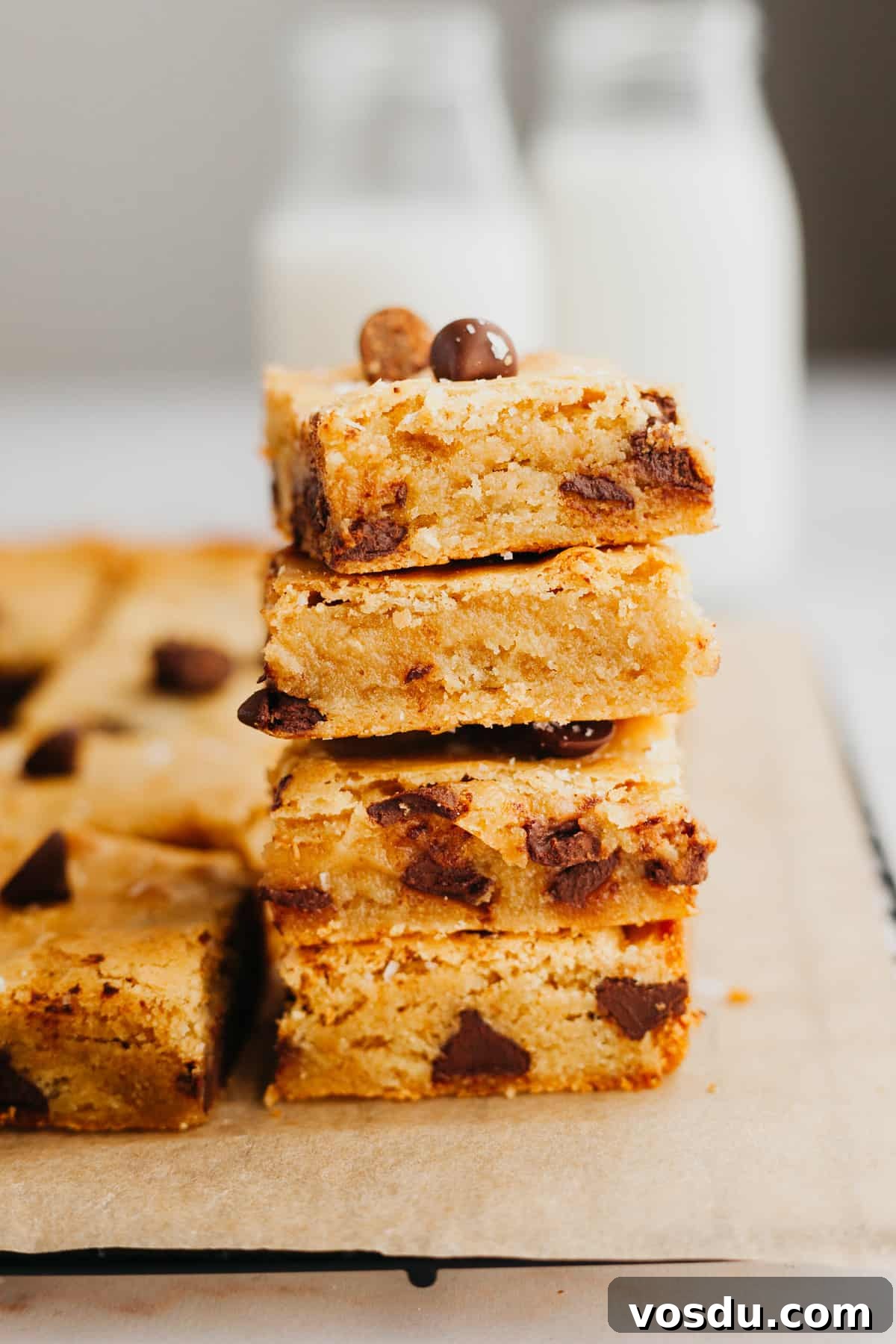 Brown Butter Blondies Made in One Bowl 2 A stack of 4 chocolate chip brown butter blondies.