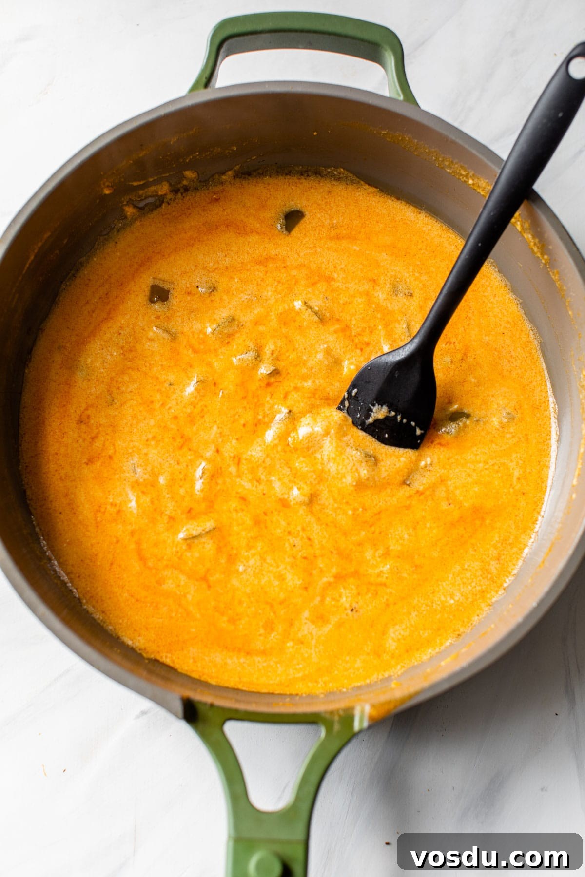 Creamy Buffalo Chicken Pasta Recipe with Tangy Wing Sauce 4 creamy buffalo sauce in a skillet