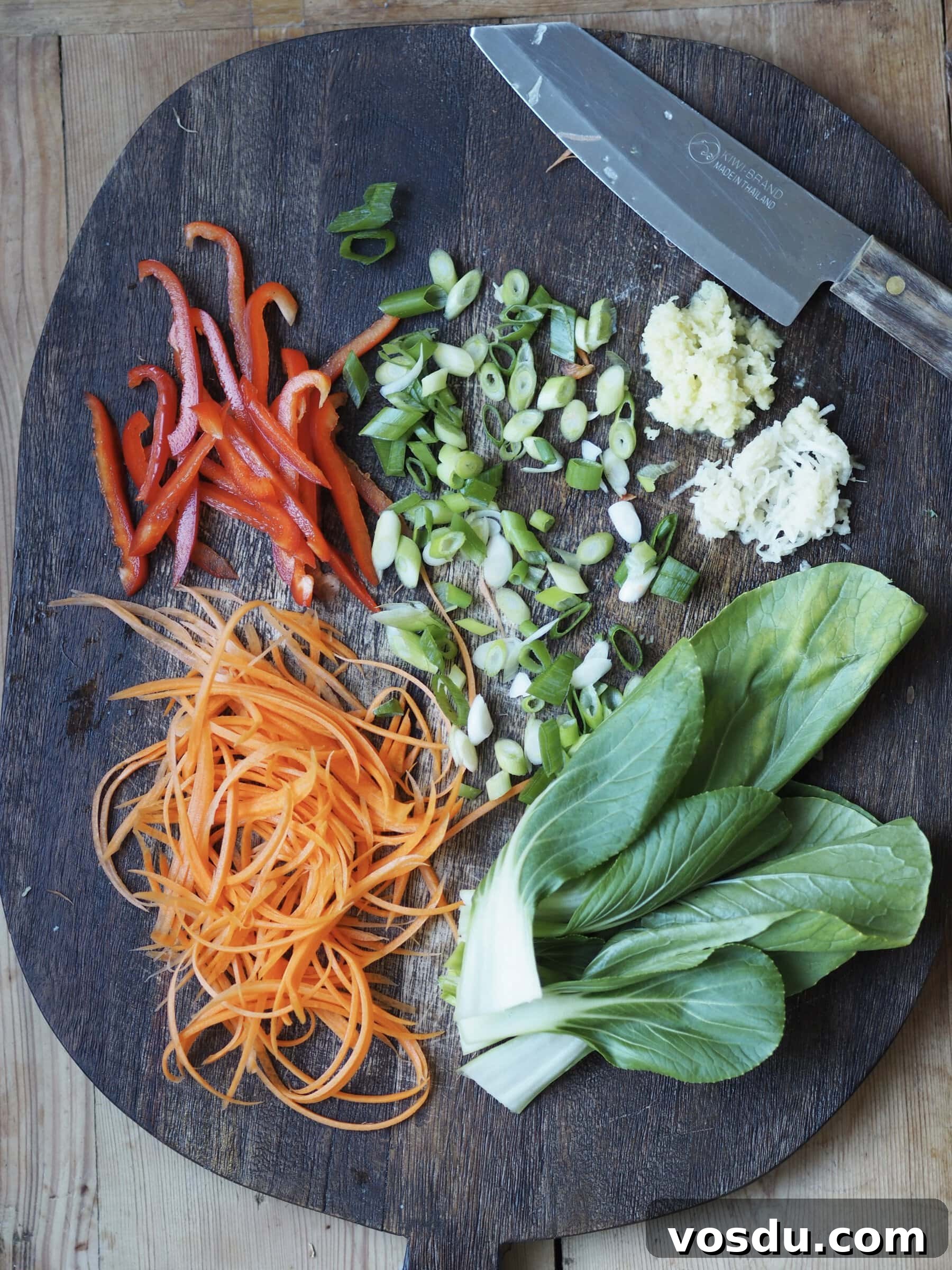 Shrimp and Chicken Fried Rice Recipe: Flavorful Weeknight Stir-Fry 4 Wooden tray with uncooked vegetables