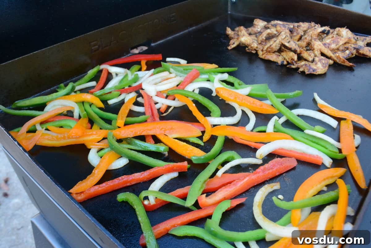 fajitas cooking on blackstone