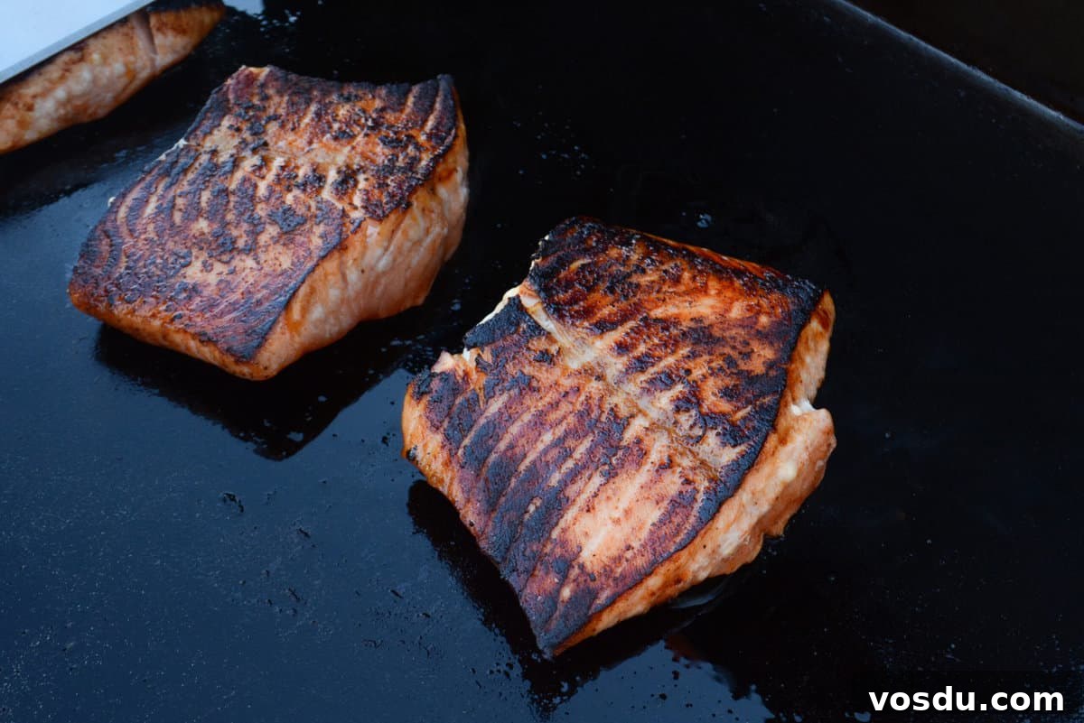 salmon cooking on blackstone