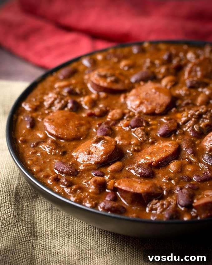 Cowboy Beans in black bowl on beige fabric