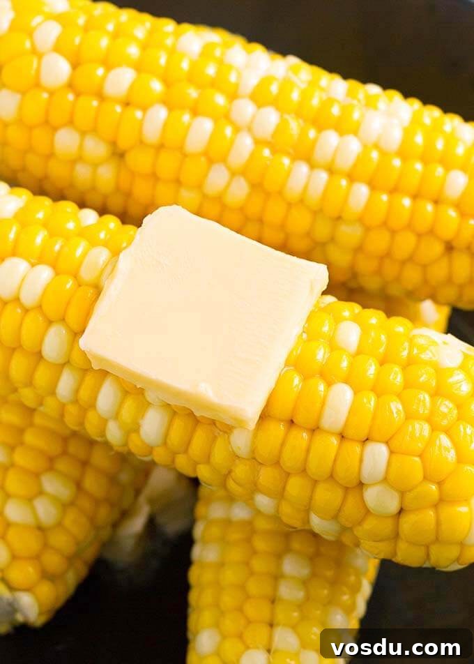 Four Corn on the Cob with square of butter