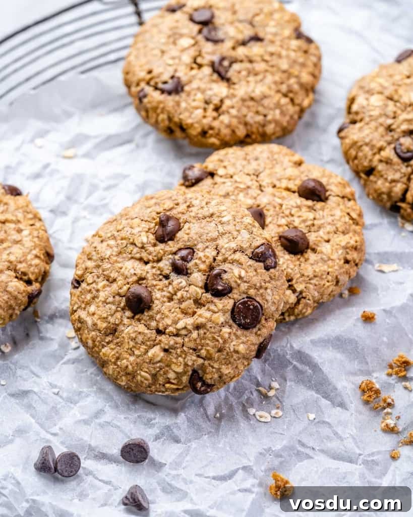 close up chocolate chip cookies on parchment paper