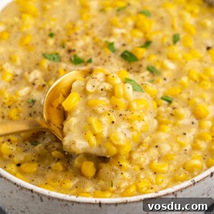 Spoonful of vegan creamed corn in bowl