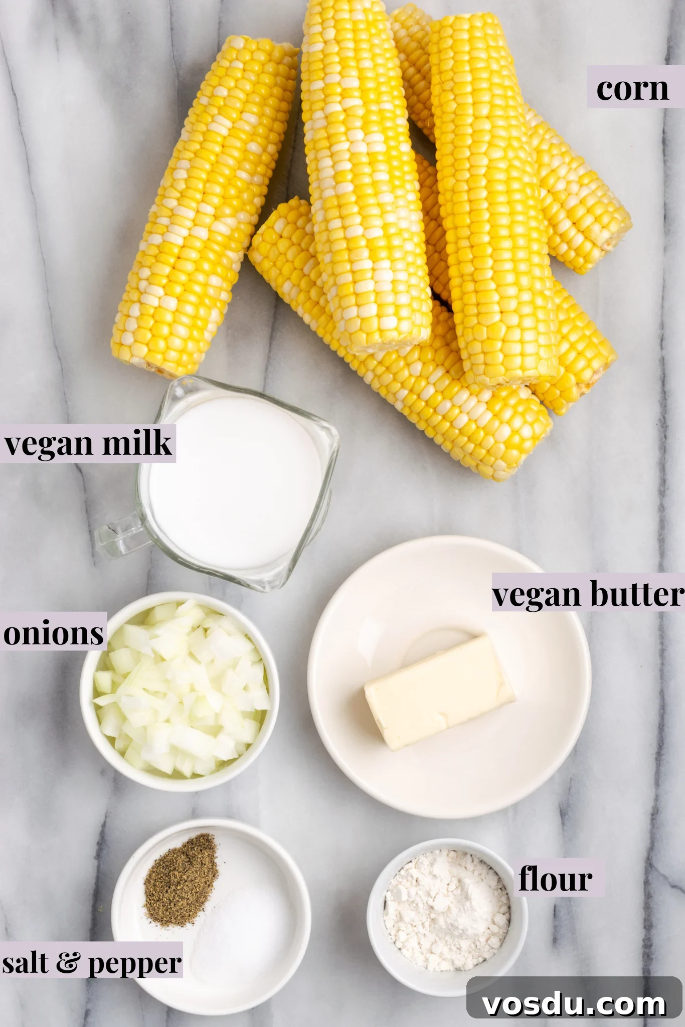 Overhead view of vegan creamed corn ingredients with labels